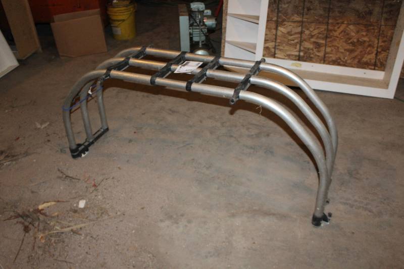 lot 5 image: AMP Research Pickup Truck Bed Metal Cargo Hold