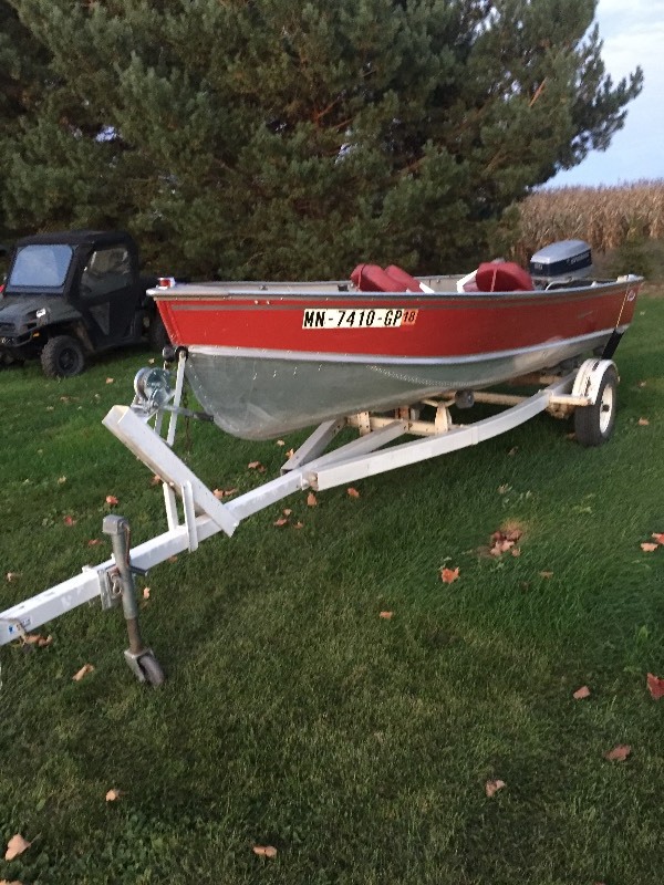 1984 LUND  ALUMINUM OPEN MOTORBOAT WITH 50 HP.  EVINRUDE