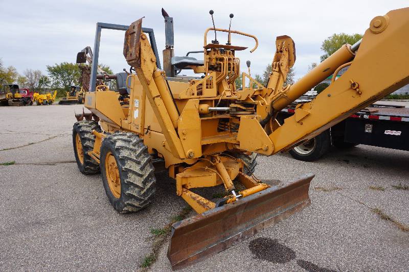 lot 7 image: Case Model 760 Diesel Powered Back Hoe Chain Trencher