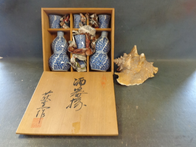 lot 62 image: Saka  Tea Set and Conch Shell