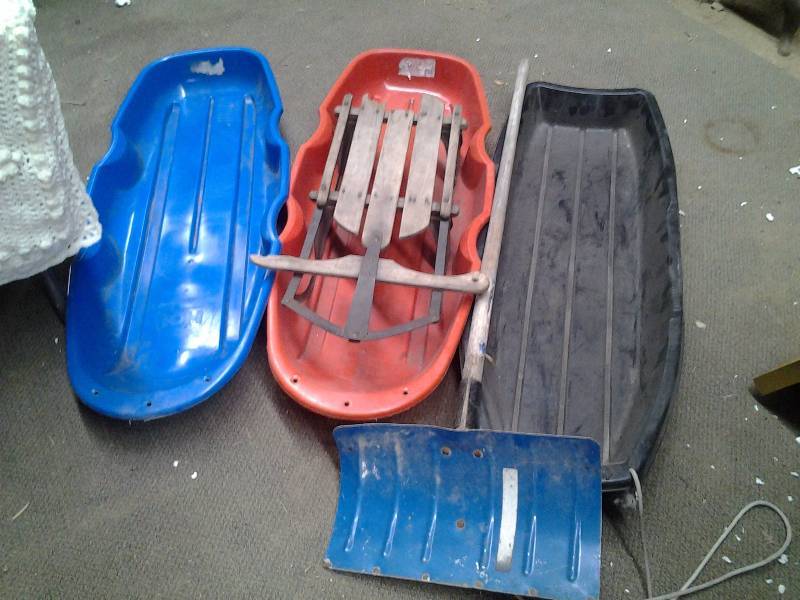 lot 47 image: 1-Steel Runner Sled, 3-Plastic Sleds, 1-Snow Shovel