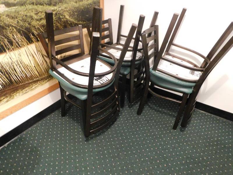 SIX METAL FRAME CHAIRS WITH GREEN PADDED SEATS