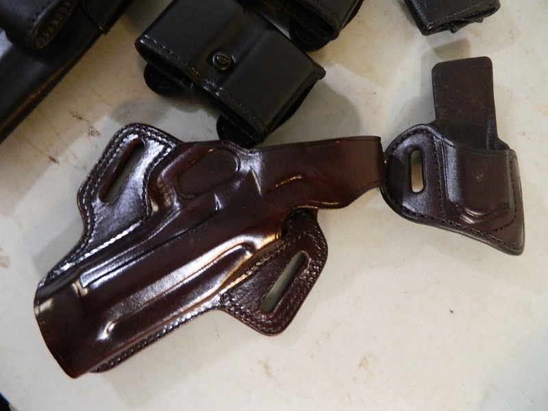 lot 22 image: Holsters, Belts, and More