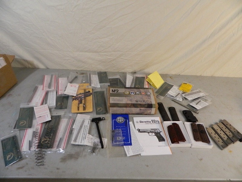 lot 23 image: Gun Parts, Springs, Magazines, Grips, Etc