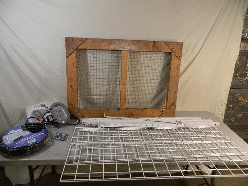 lot 70 image: New Air Hose, Light, Dirt Sifter and Hanging Ceiling Garge ShelfOrganizer