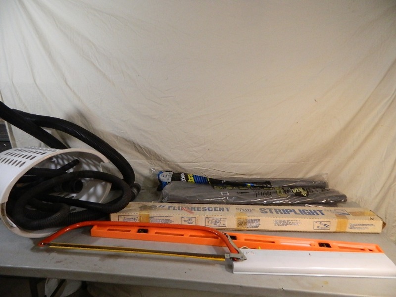 lot 86 image: New Pipe Insulation, Saw, and More