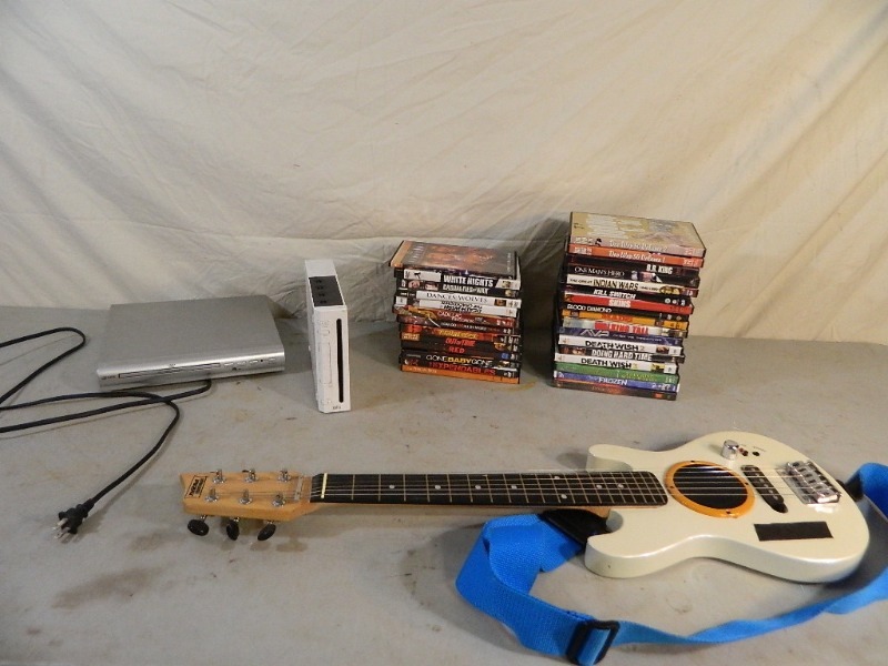 lot 150 image: Dvds, Wii Console, and More