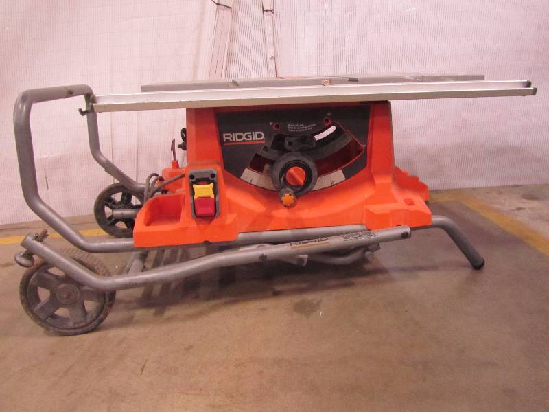 lot 18 image: RIDGID 15 Amp 10 in. Heavy-Duty Portable Table Saw with Stand