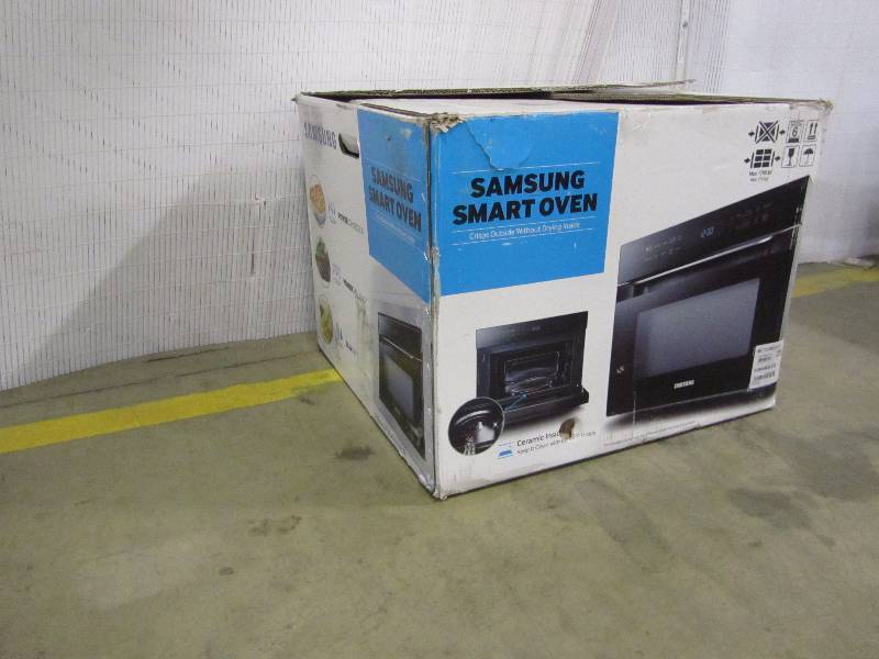lot 33 image: Samsung 1.2 cu. ft. Countertop Power Convection Microwave