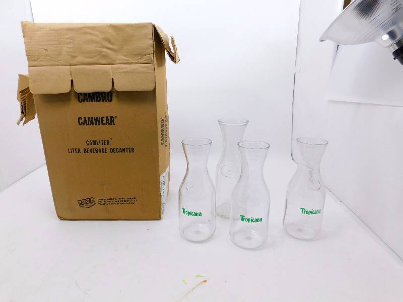 lot 35 image: (12) Plastic(1) Glass Water Pitchers