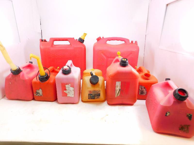 lot 64 image: (9) Gas Cans