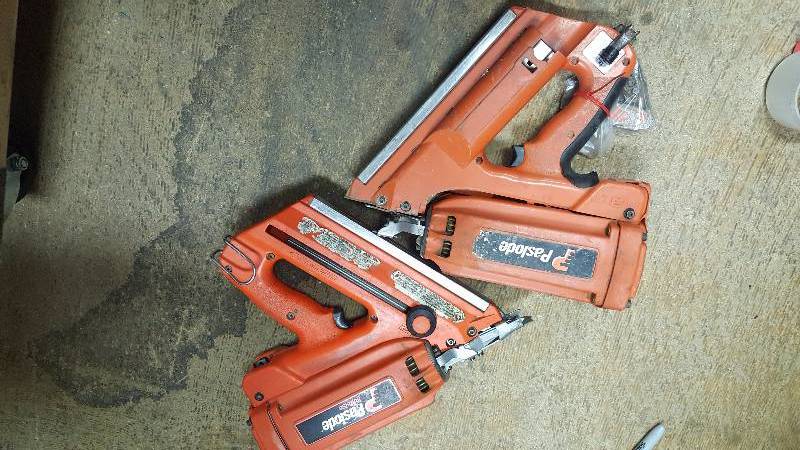 lot 96 image: Paslode 900420 Cordless IMCT Framing Nailer for parts or not wokri need battery or charger and repair total of 2