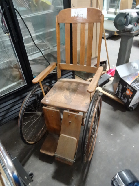 lot 126 image: Antique Wheel Chair, Metal Frame Wood Seat