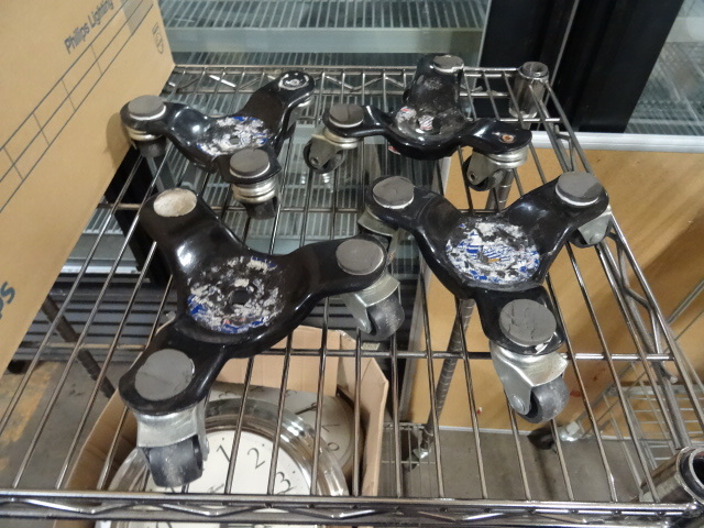 lot 152 image: 4 Piece Cup Caster Set