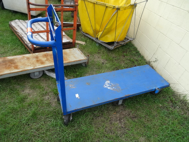 lot 39 image: 4 Wheel Poly Tub Cart 19 X 55 X 42