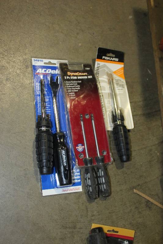 lot 207 image: Lot of (4) Hand Tools Includes Powergrip Screwdriver Set, 2-Piece Star Driver Set, AC Delco Upholstery Panel Remover