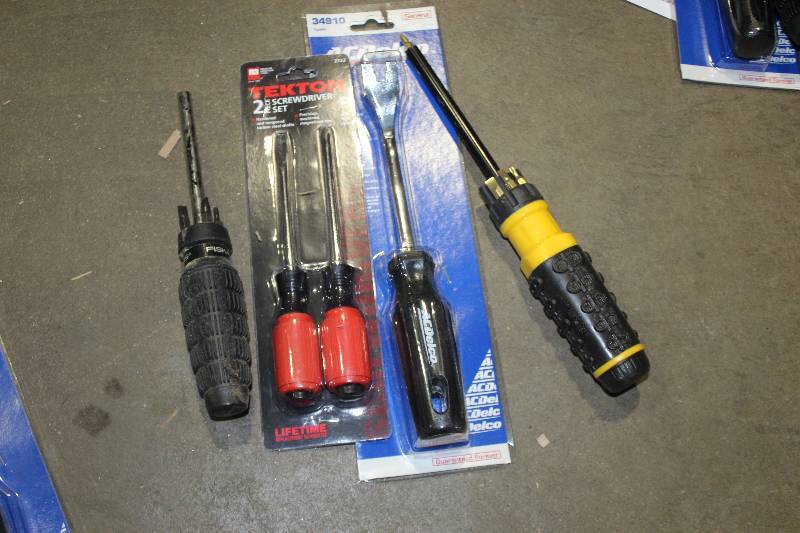 lot 212 image: Lot of (4) Hand Tools Includes Tekton 2-Piece Screwdriver Set, AC Delco Upholstery Removal Tool, Performance Tool Multi-Screwdriver