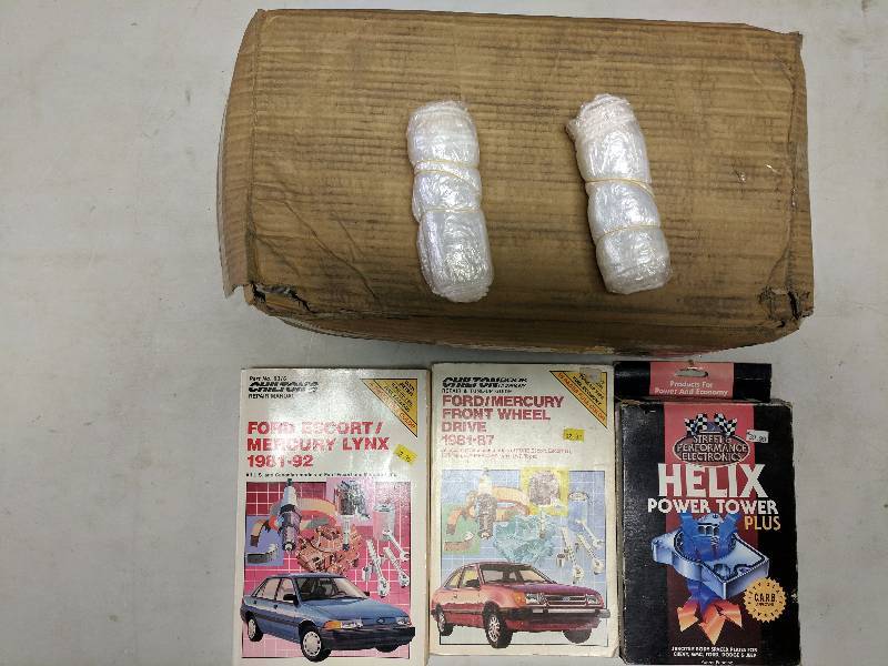 lot 97 image: Helix Power Tower Plus Throttle Body Spacer  Chiltons Books