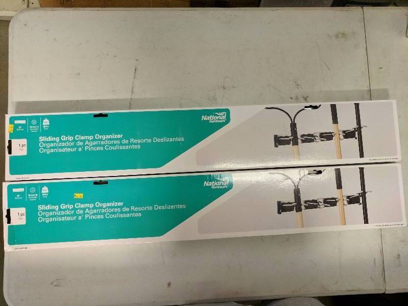 lot 134 image: (2) Sliding Grip Clamp Organizers