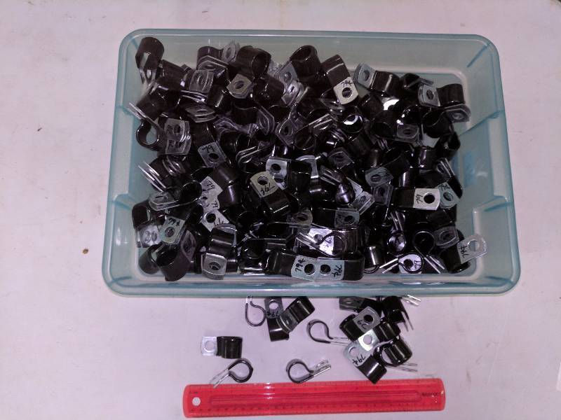 lot 256 image: 34 Coated Metal Clamps - Bin