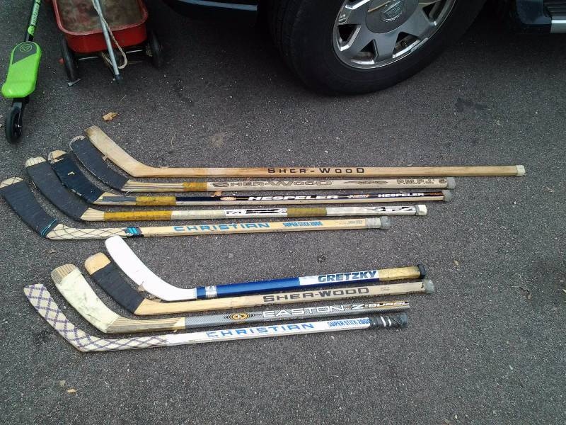 lot 35 image: 8-Hockey Sticks