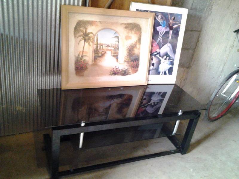lot 43 image: Glass Top TV Stand 48 Inches, 2-Framed Pictures
