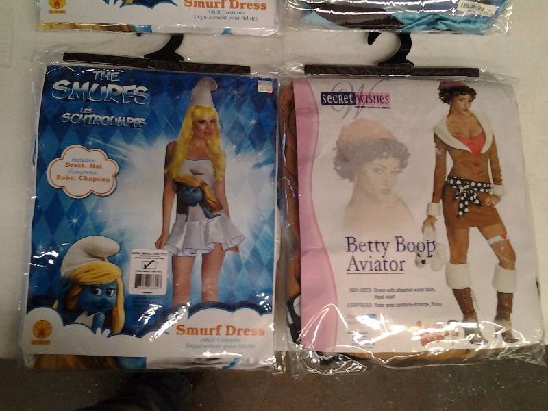 lot 84 image: 2-Halloween Costumes-Betty Boop, Aviator XS & Smurfs Dress XS