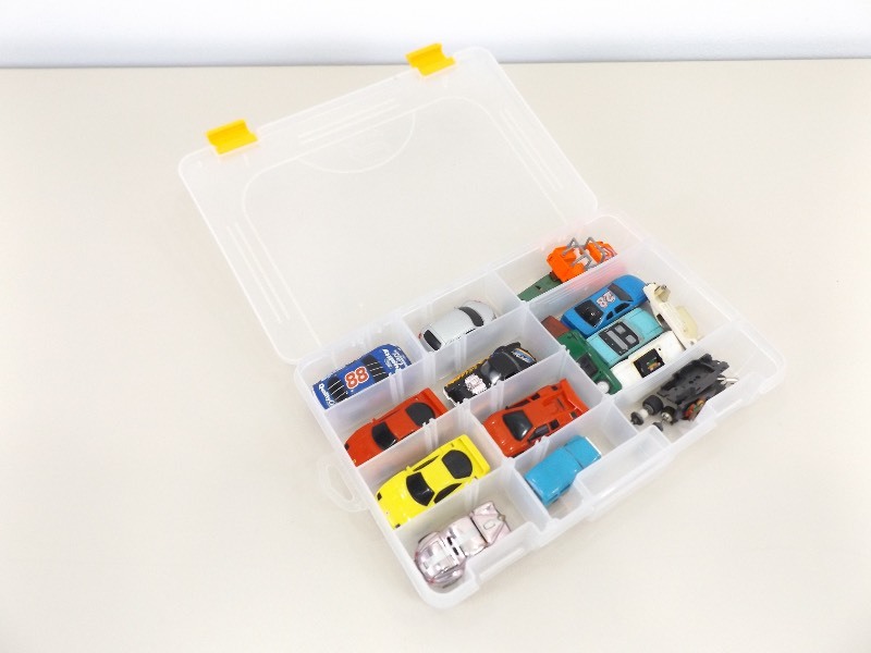 Vintage Slot Cars, and Parts in Plastic Holder