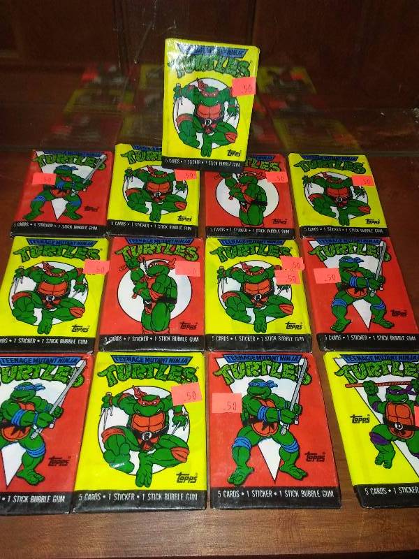 lot 27 image: 1989 T.M.N.T. (Teenage Mutant Ninja Turtles) Cards (13 wax packs)