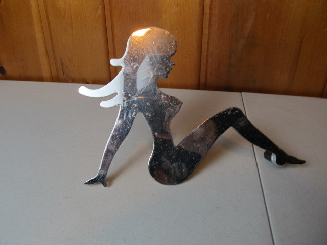 lot 110 image: 9 Chrome Lady Truck Hood Ornament