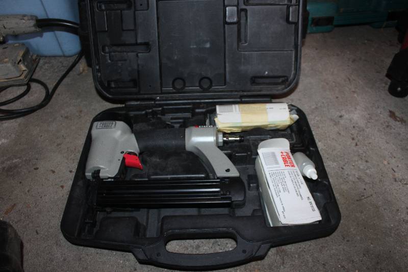 lot 319 image: Porter-Cable Air Brad Nailer w Manual, Case
