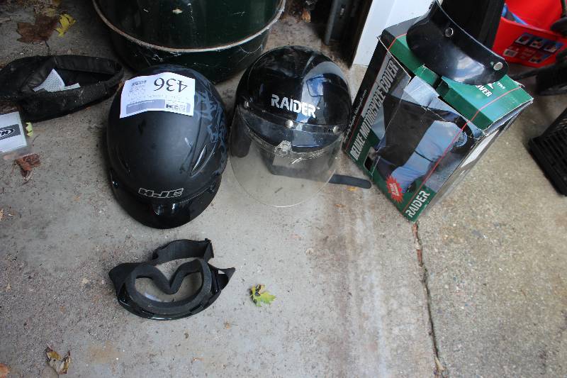 lot 436 image: Lot of (3) Motorcycle Accessories Includes 2-Helmets, 1-Raider Deluxe Rain Cover