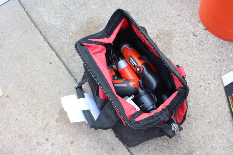 lot 473 image: Tool Bag w Black & Decker 3.6V Cordless Power Tools