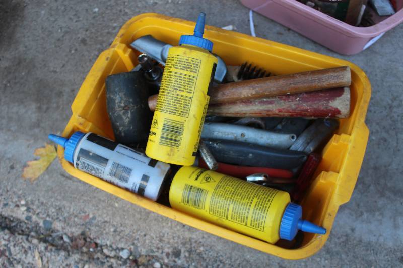 lot 517 image: Bin Lot of Misc Tools Includes Rasps, Chisels, Wrenches, Chalk Line, Measuring Tape, And More