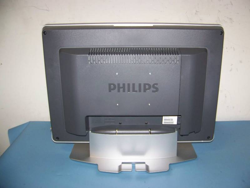 lot 15 image: 23, Philips, LCD, Widescreen, HDTV on Stand with Remote Control