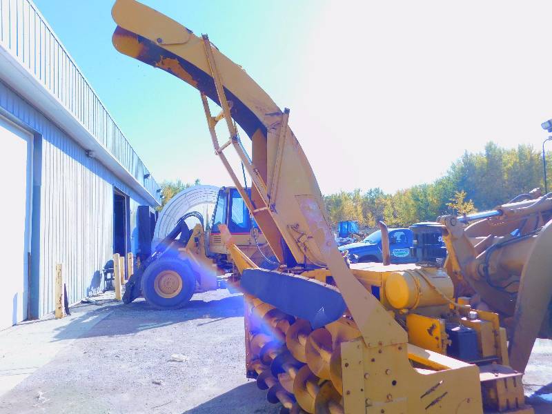 Snogo Loader-Mounted Snow Blower - Works | Commercial Lawn Service