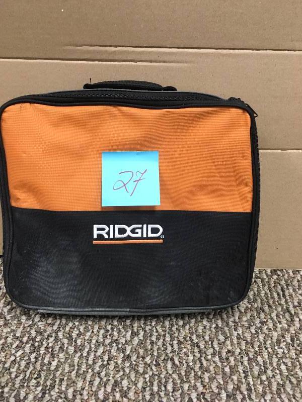 lot 27 image: RIDGID 8-Amp 12 in. Heavy-Duty Variable Speed Reversible Drill used working good with bag and handle