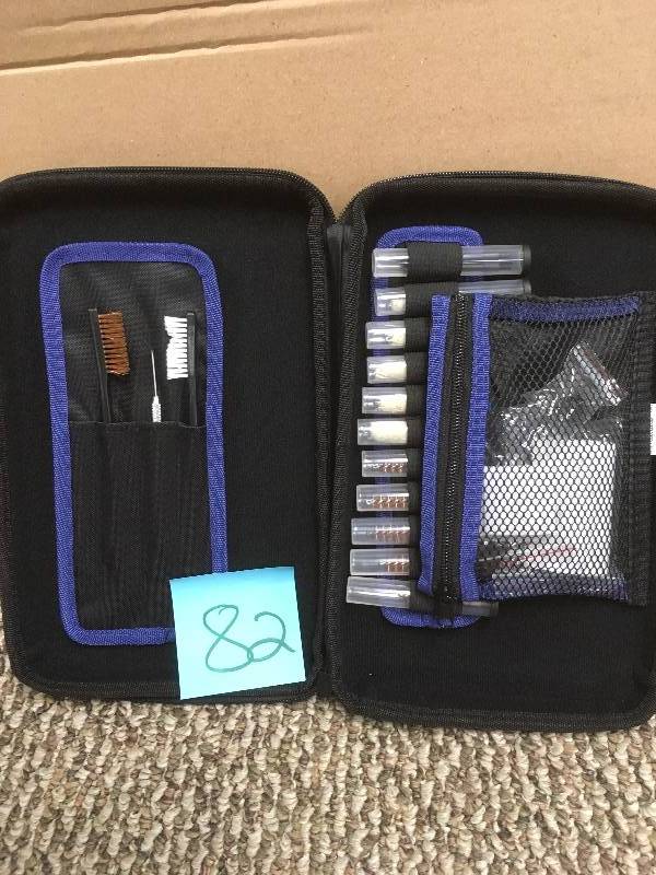 lot 82 image: Gunmaster 22-piece Soft Sided Pistol Cleaning Kit in box
