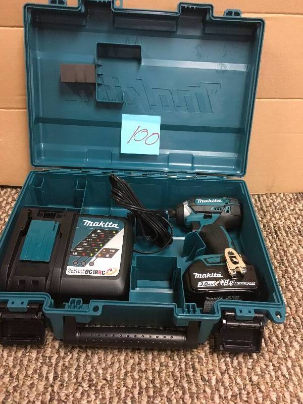 lot 100 image: Makita USA - 18 Volt LXT Lithium-Ion 14 in. Cordless Impact Driver Kit (3.0Ah) in box MSRP $199