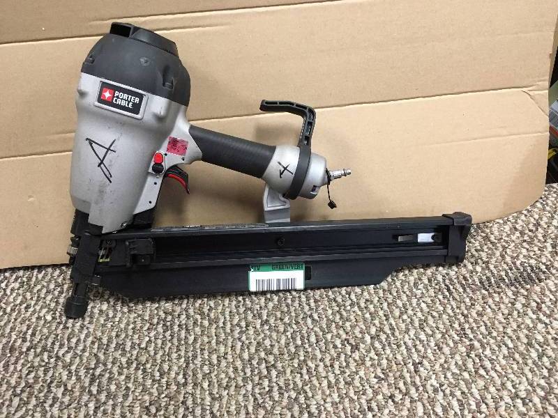 lot 109 image: Porter-Cable FR350B 3-12-Inch Full Round Framing Nailer in box good working condition