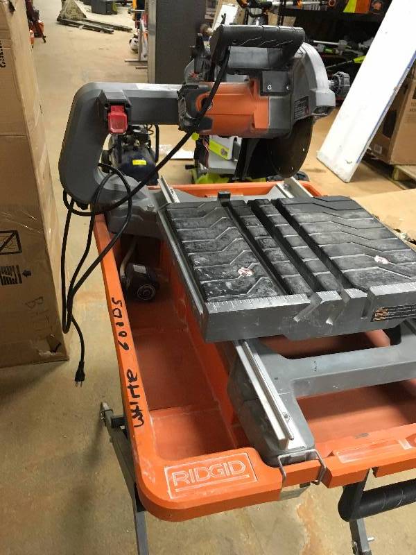 lot 132 image: RIDGID 8 in. Tile Saw with Stand USED IN WORKING CONDITIONS