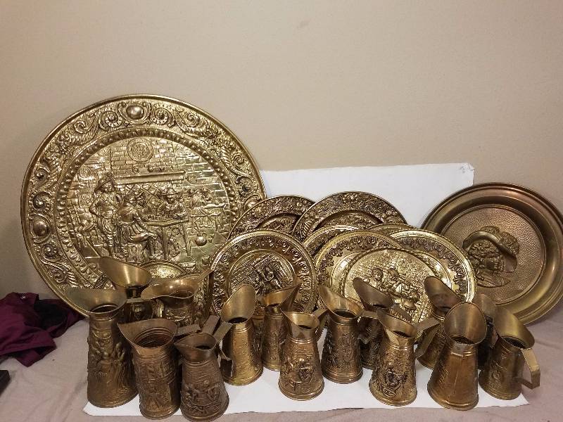 lot 50 image: Tin wall dcor and Water Pitchers