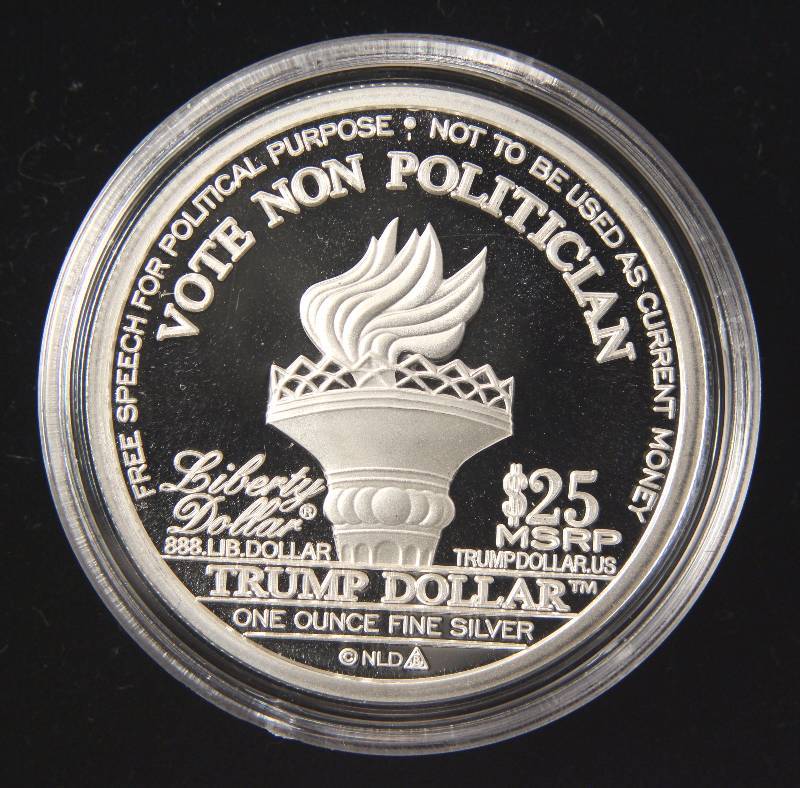 1 TROY OZ. .999 FINE SILVER TRUMP ROUND IN AIRTITE HOLDER