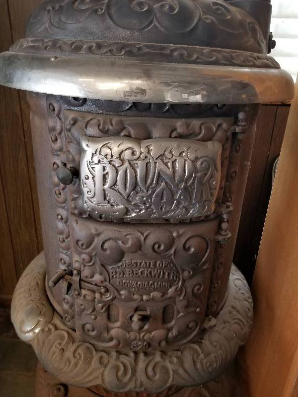 P.D. Beckwith Antique Round Oak Wood Burning Cast Iron Parlor Stove |  2003 Acura TLS, 1976 Olds Regency 98, 16FT Trailer, Farm Implements, Large  Ext Ladders, Lumber, Tool/Shop, Wagon Wheels, P/U Salt