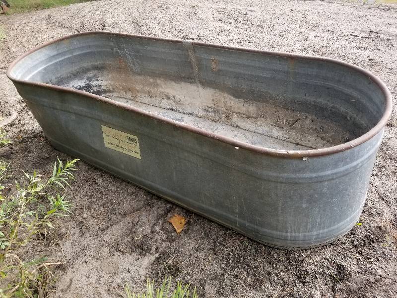 lot 19 image: Galvanized Stock Tank, 8FTx30