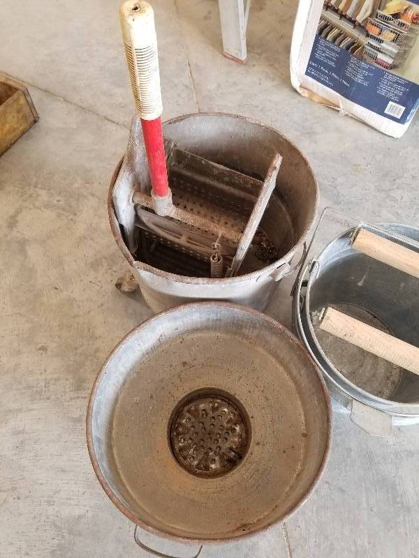 lot 54 image: Lot - Galvanized Milk Can Strainer, Mop Buckets