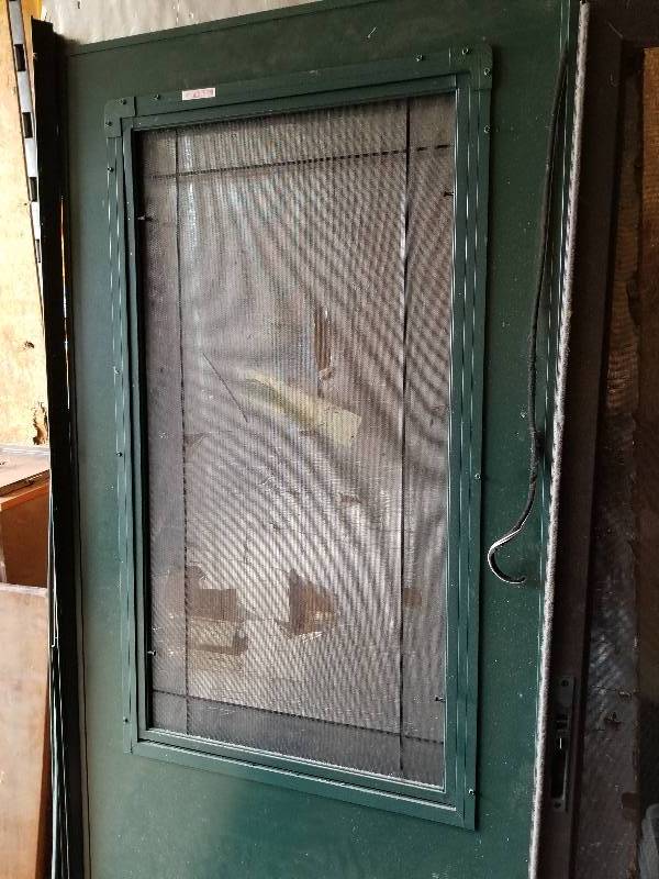 lot 119 image: Never Used, LARSON Premium Storm Door with Hardware, 79x32