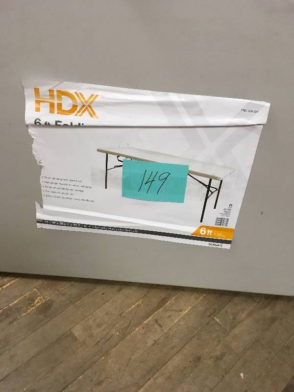 lot 149 image: 6 ft  never used HDX Earth Tan Folding Table
