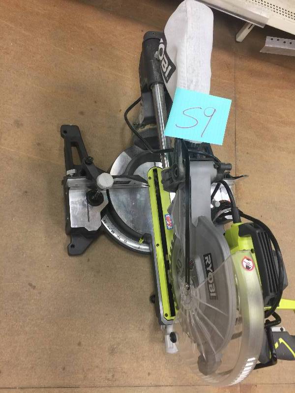 lot 59 image: Ryobi 15 Amp 12 in. Sliding Miter Saw used in good working condition