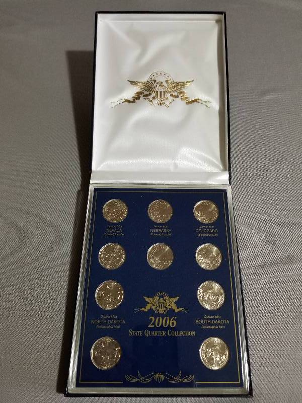 lot 61 image: 2006 Philadelphia Mint State Quarters Collection in Display - Uncirculated